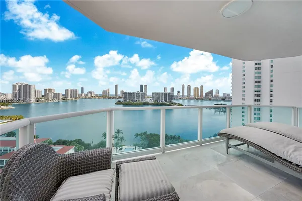 a view of a lake from a balcony