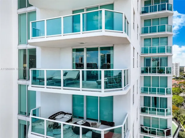 a front view of a building with a couple of windows