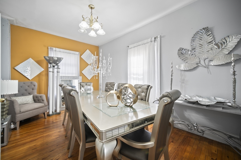 14-16 Dexter Street Lynn, MA 01902 - Photo 11 of 33 a view of a dining room with furniture and wooden floor