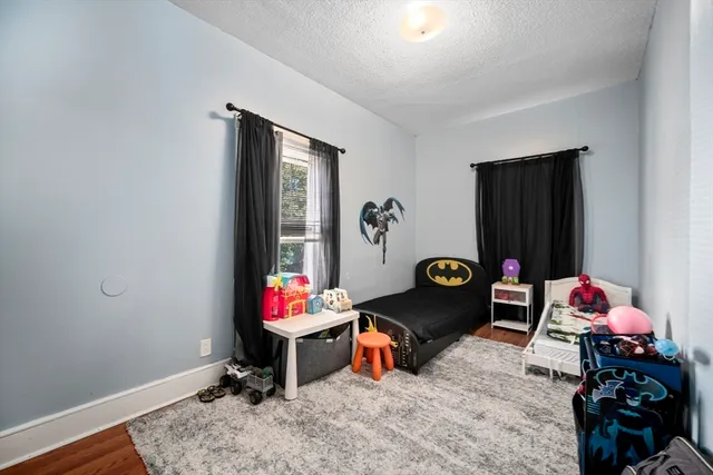 a living room with a couch and a table