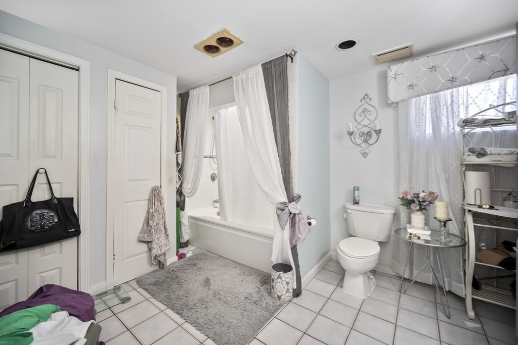 14-16 Dexter Street Lynn, MA 01902 - Photo 23 of 33 a bathroom with a sink toilet and shower