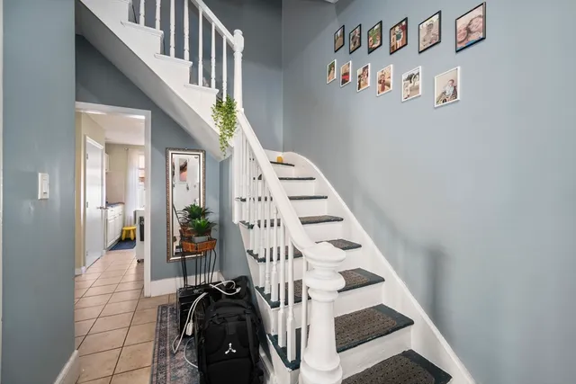 a view of entryway with furniture and rug