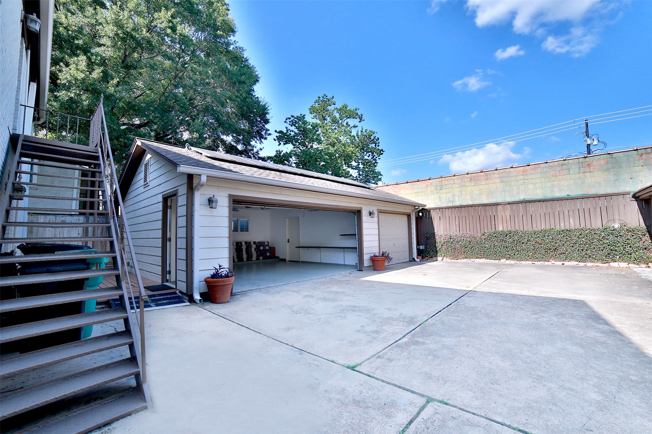 2625 Peckham Street Houston, TX 77098 - Photo 25 of 27 a view of a house with a garage and fireplace