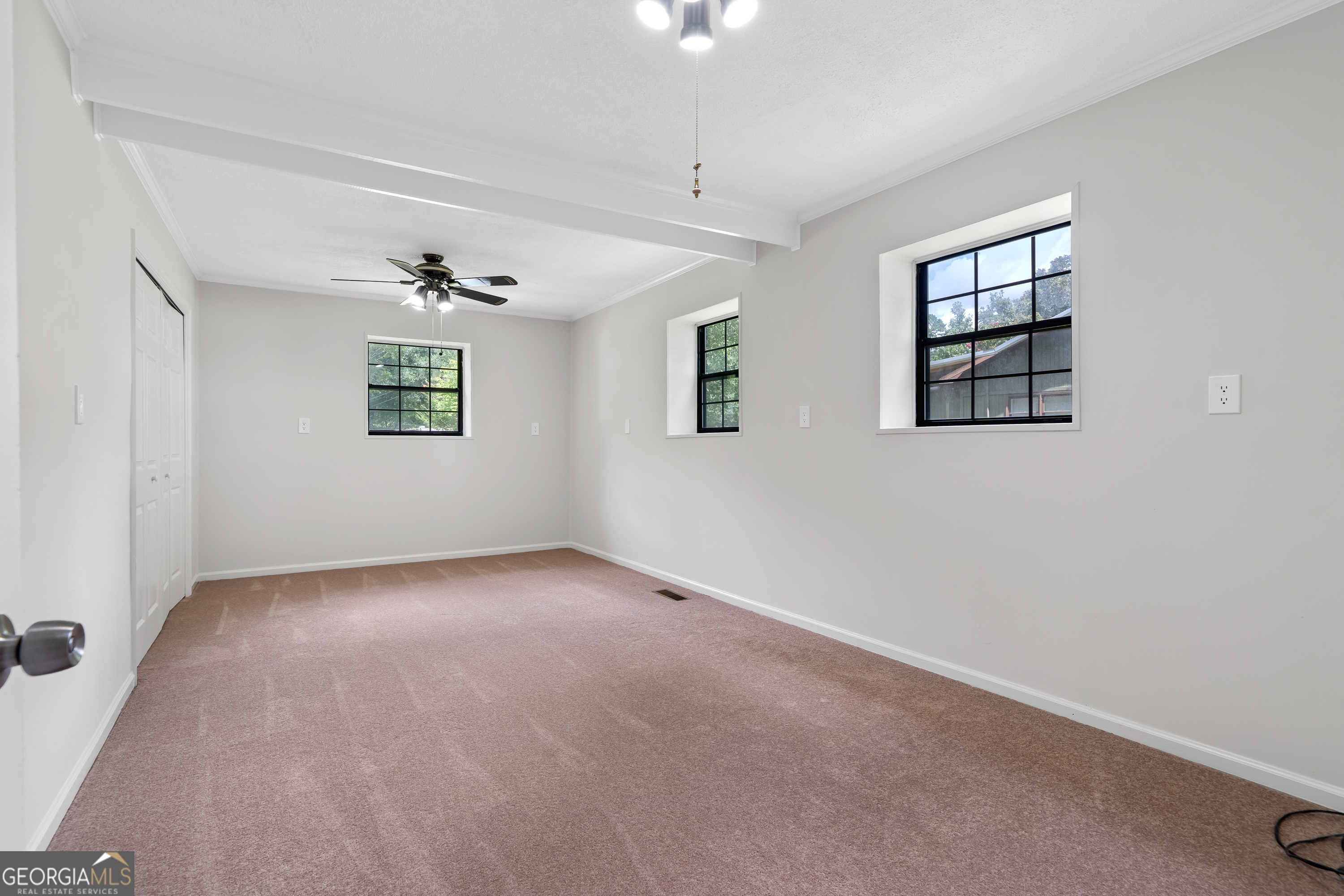 274 South Steel Bridge Road Eatonton, GA 31024 - Photo 16 of 39 a view of an empty room with a window