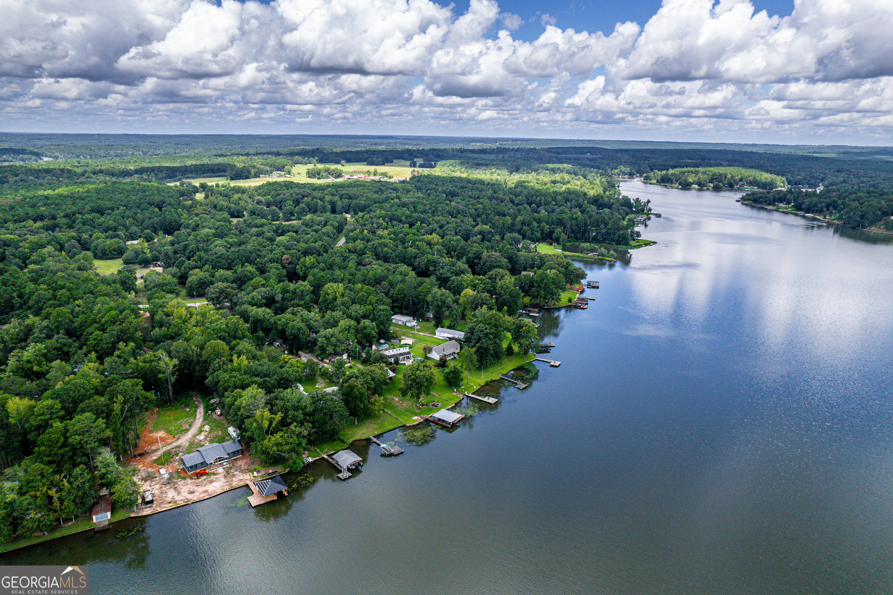 274 South Steel Bridge Road Eatonton, GA 31024 - Photo 21 of 39 a view of a back yard of a house