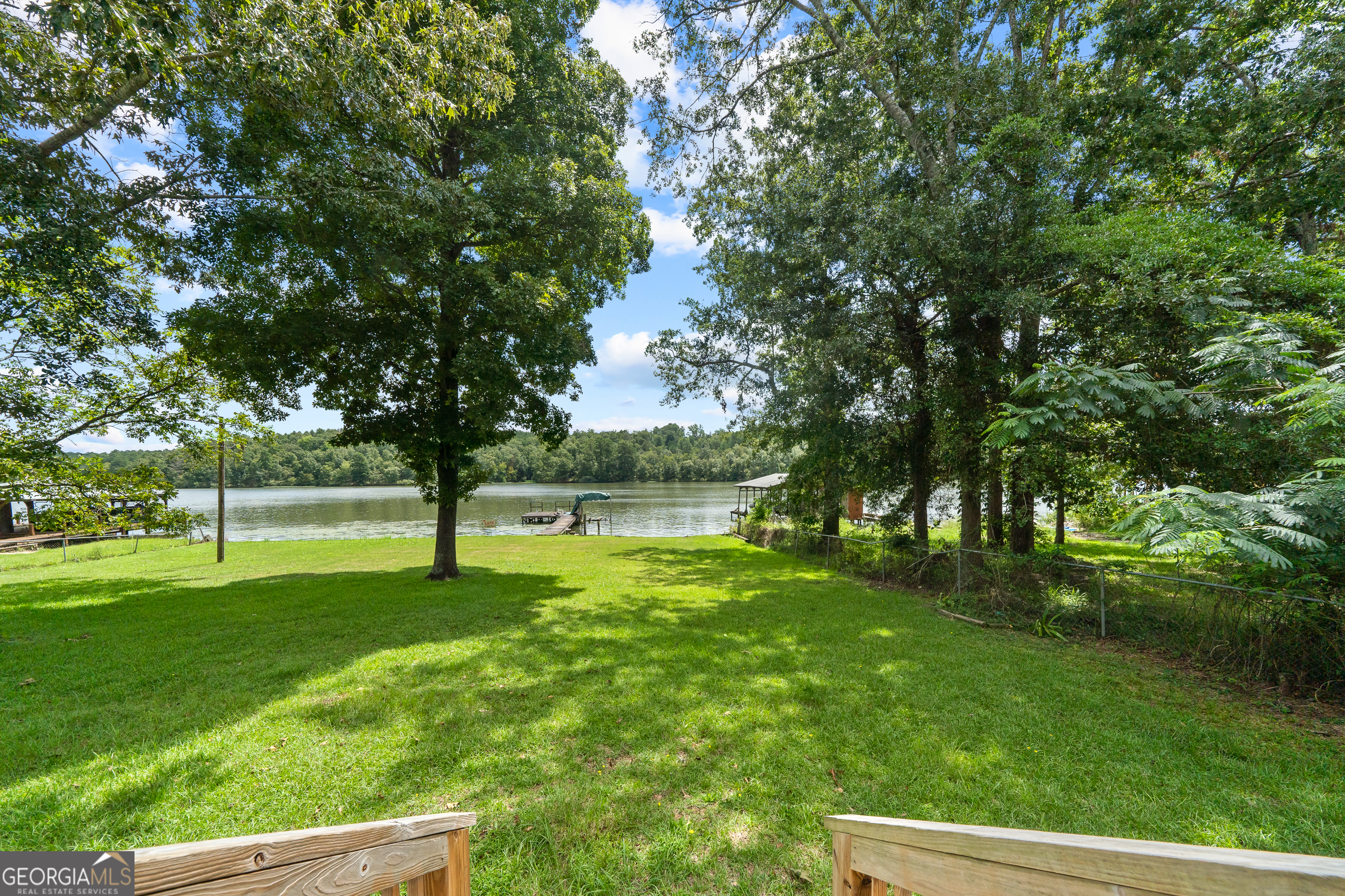 274 South Steel Bridge Road Eatonton, GA 31024 - Photo 29 of 39 a view of a backyard with large trees