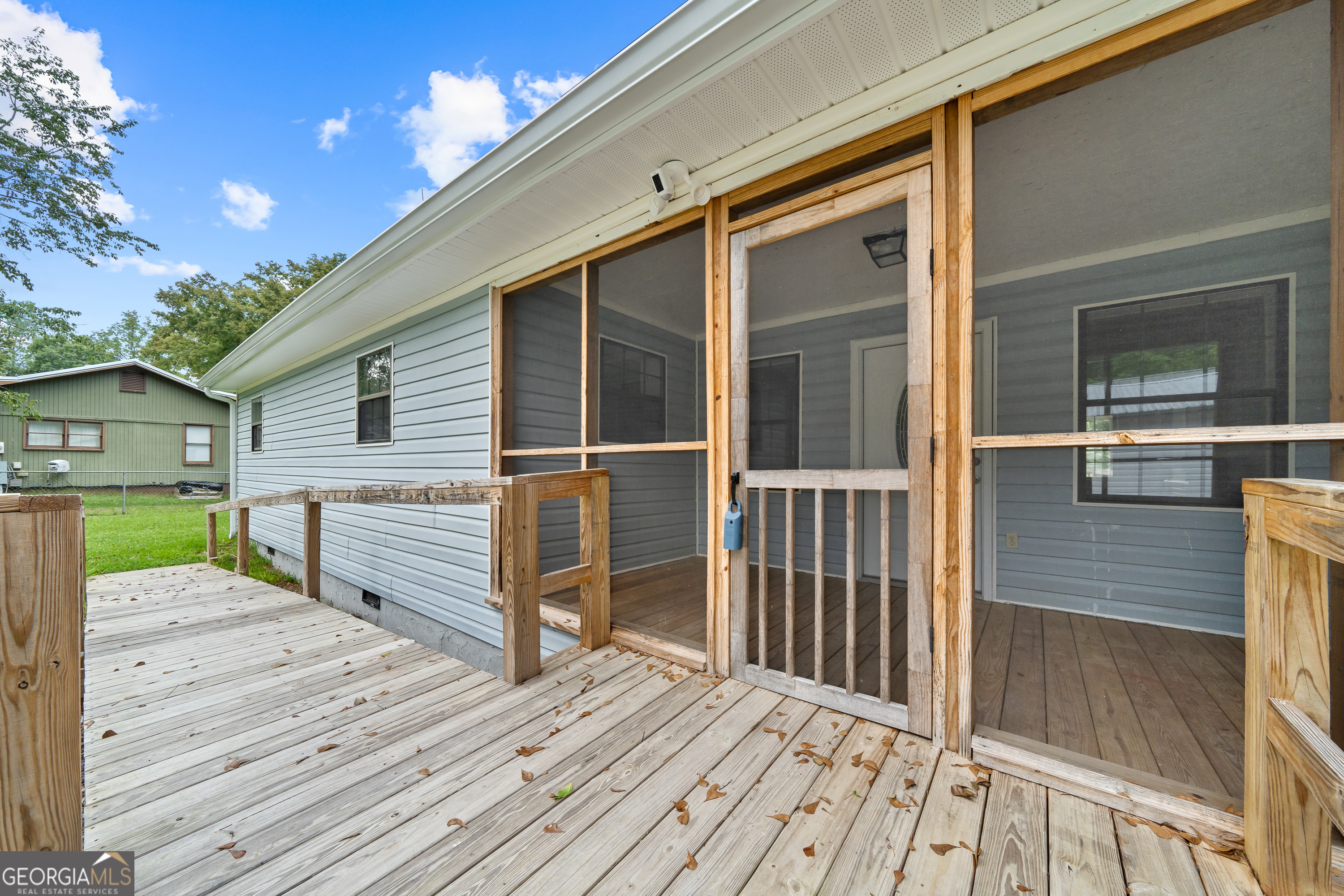 274 South Steel Bridge Road Eatonton, GA 31024 - Photo 33 of 39 a view of a house with wooden floor