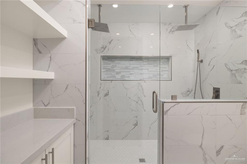 34732 Kretz Road, Unit 2 Los Fresnos, TX 78566 - Photo 11 of 22 a bathroom with a shower and a sink