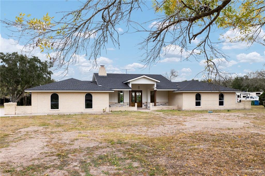 34732 Kretz Road, Unit 2 Los Fresnos, TX 78566 - Photo 2 of 22 a house with a outdoor space
