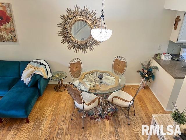3550 Devils Glen Road Bettendorf, IA 52722 - Photo 11 of 30 a view of a dining room with furniture