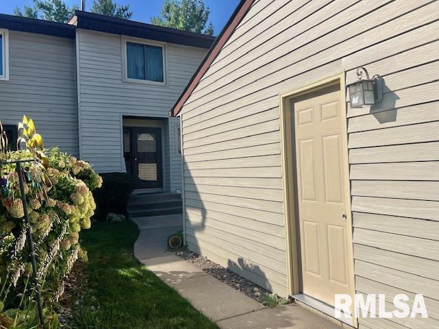 3550 Devils Glen Road Bettendorf, IA 52722 - Photo 2 of 30 a view of a back side of house