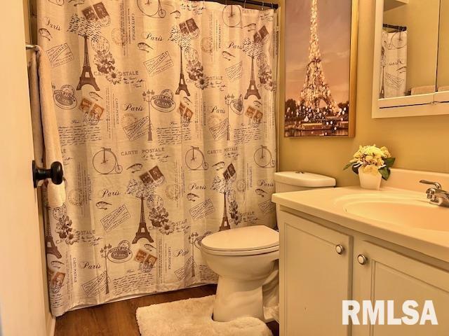 3550 Devils Glen Road Bettendorf, IA 52722 - Photo 22 of 30 a bathroom with a sink and a toilet