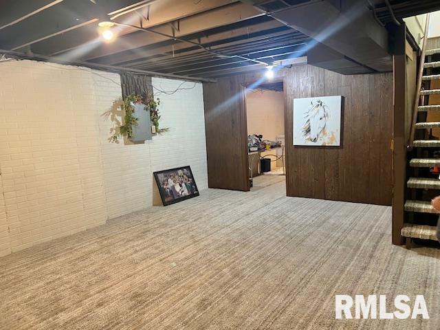 3550 Devils Glen Road Bettendorf, IA 52722 - Photo 24 of 30 a bedroom with a bed and a large mirror