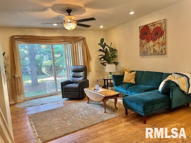 3550 Devils Glen Road Bettendorf, IA 52722 - Photo 8 of 30 a living room with furniture and a large window