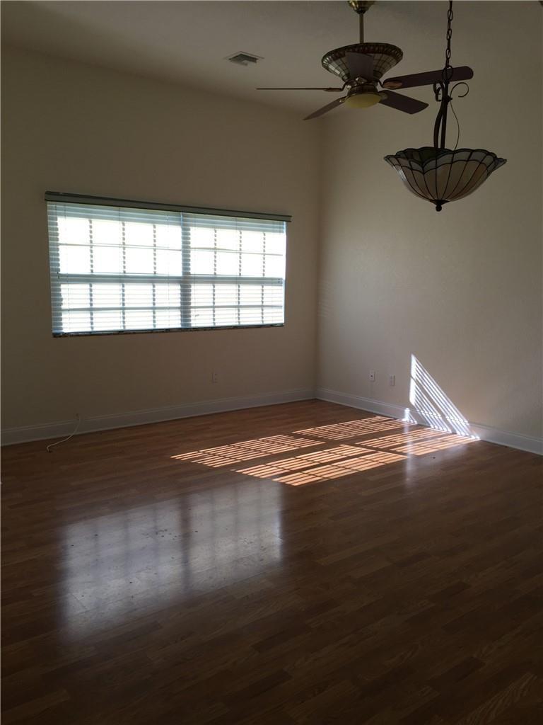 17431 Southwest 54th Street Southwest Ranches, FL 33331 - Photo 54 of 59 a view of room with hardwood floor and window