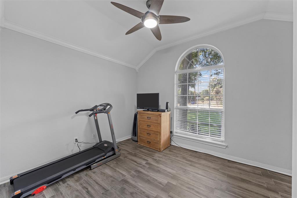11209 Tree Lake Drive Waco, TX 76708 - Photo 20 of 40 wooden floor in an empty room with a window
