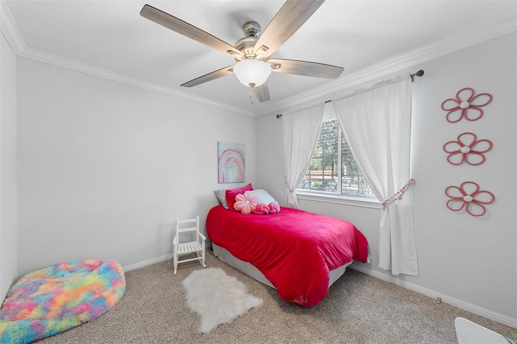11209 Tree Lake Drive Waco, TX 76708 - Photo 21 of 40 a bedroom with a bed and a window