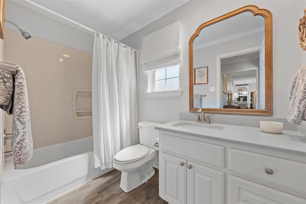 11209 Tree Lake Drive Waco, TX 76708 - Photo 22 of 40 a bathroom with a sink a toilet and shower