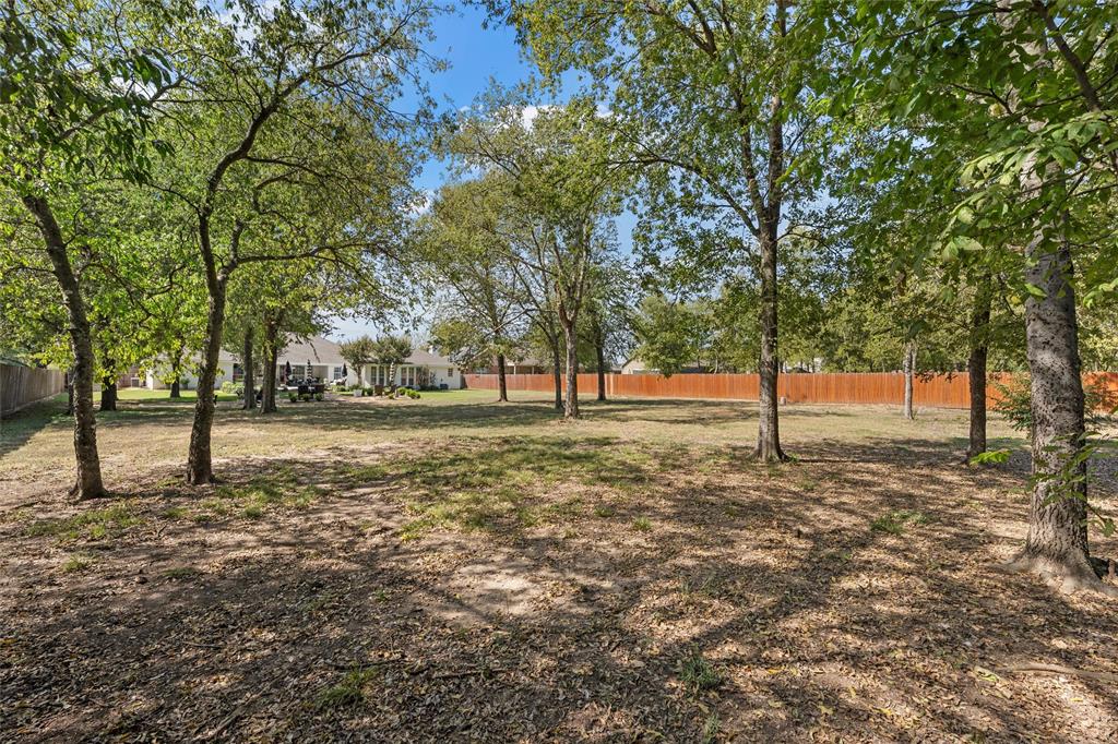 11209 Tree Lake Drive Waco, TX 76708 - Photo 31 of 40 a view of outdoor space with trees