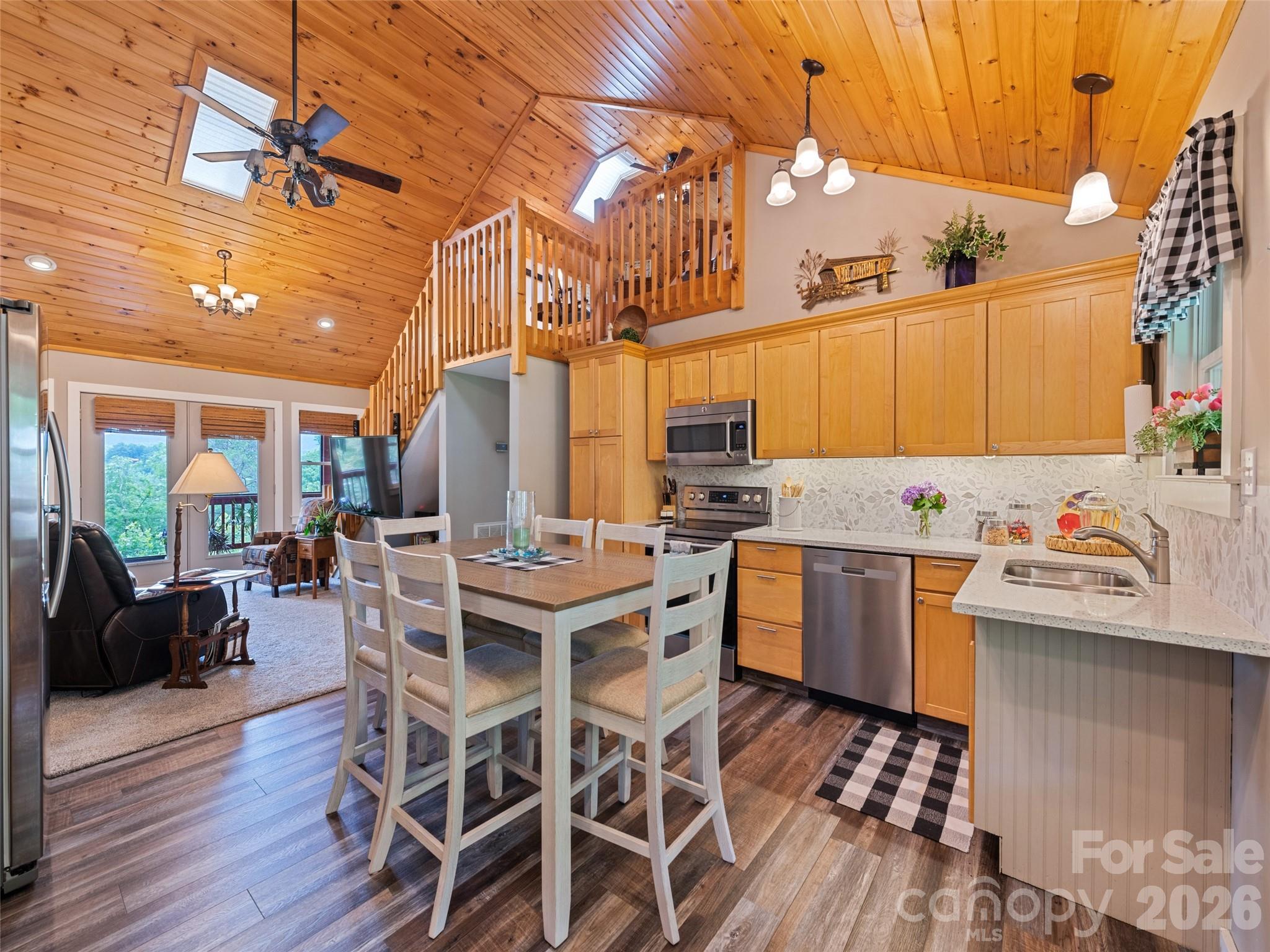 70 Lollis Lane Bryson City, NC 28713 - Photo 21 of 39 a view of kitchen with cabinets and wooden floor
