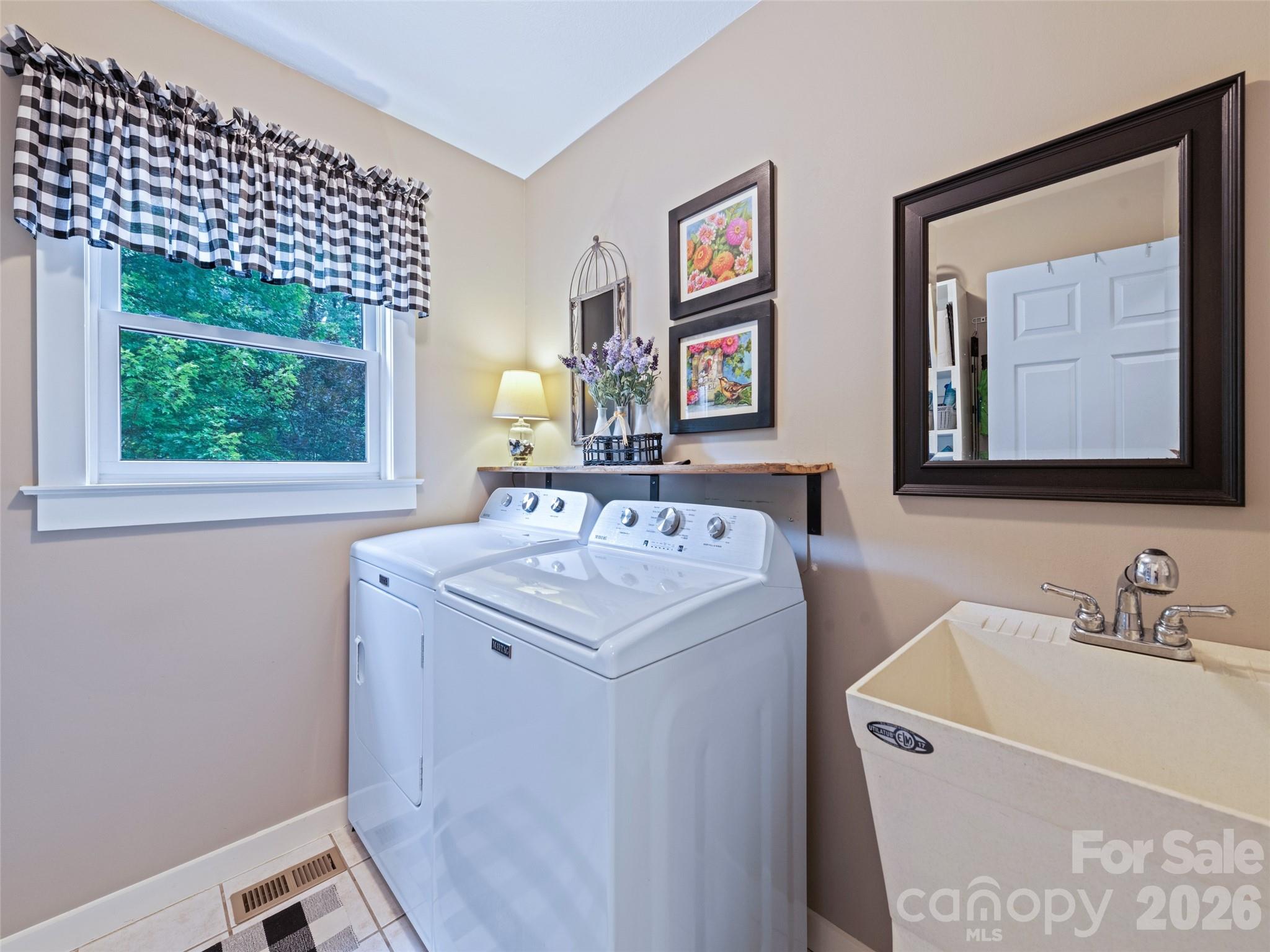 70 Lollis Lane Bryson City, NC 28713 - Photo 26 of 39 a bathroom with a sink and a mirror