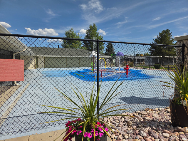 1275 Thrush Road Salt Lake City, UT 84123 - Photo 20 of 20 Splash pad area featuring a light blue ground surface with a darker blue central design
