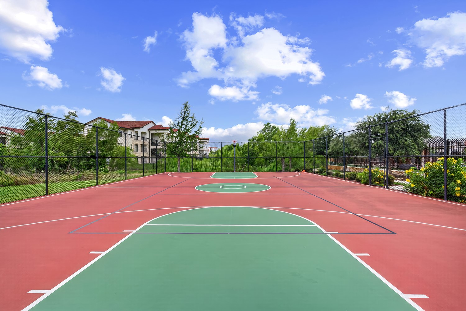 2006 Grow Lane Austin, TX 78754 - Photo 32 of 40 A well-maintained basketball court awaits your competitive spirit.