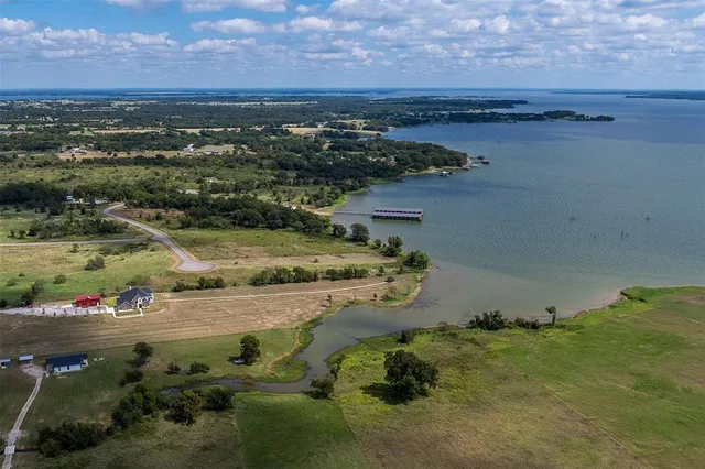 a view of a swimming pool and an outdoor space