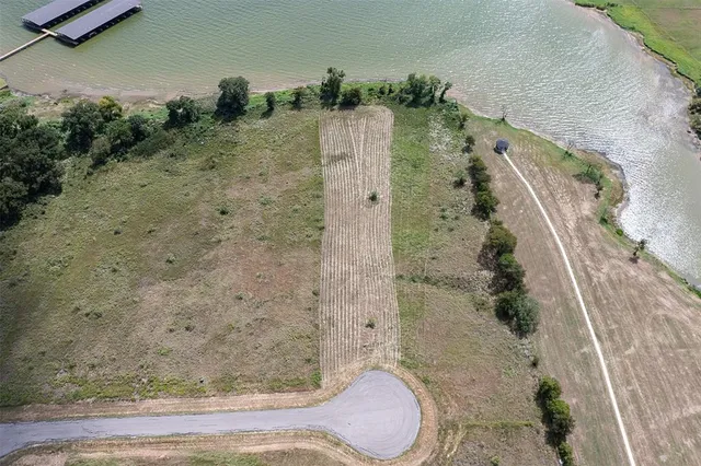 a view of swimming pool with a yard