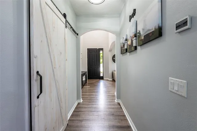 a kitchen with stainless steel appliances a refrigerator stove and sink