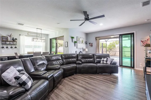 a living room with furniture and a window