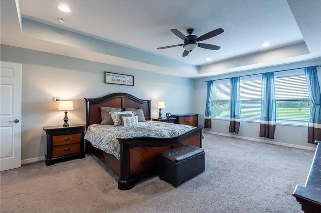 a view of an aerial view of residential houses with outdoor space and lake view