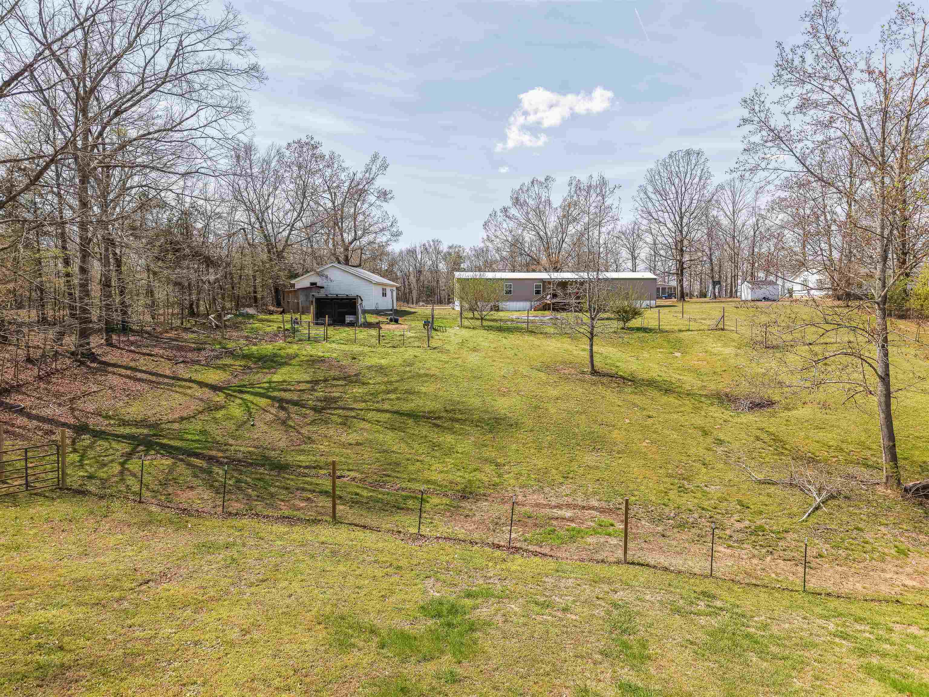 7010 22nd Highway Adamsville, TN 38310 - Photo 26 of 33 a swimming pool with an outdoor space and seating area