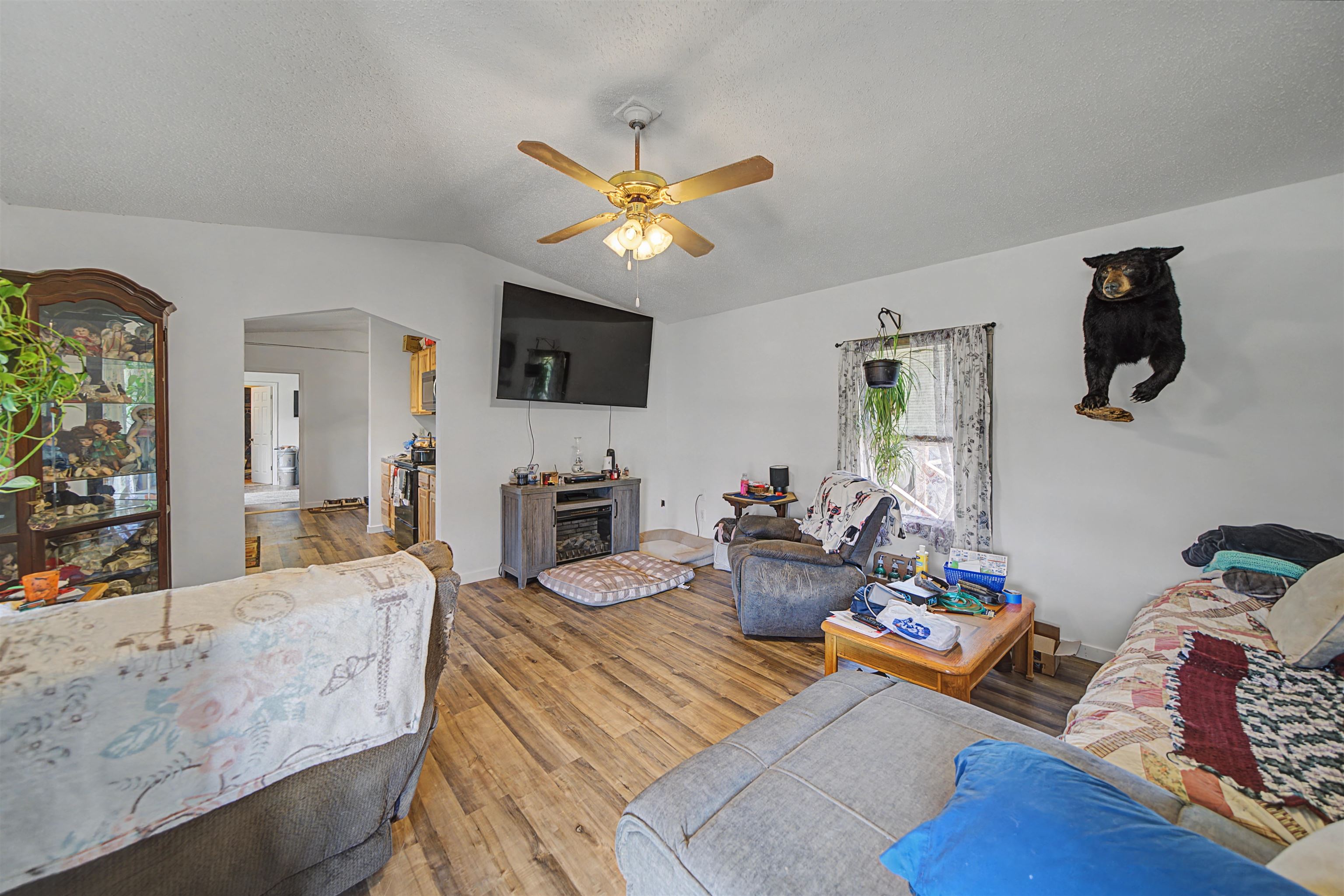 7010 22nd Highway Adamsville, TN 38310 - Photo 4 of 33 a living room with furniture a flat screen tv and a window