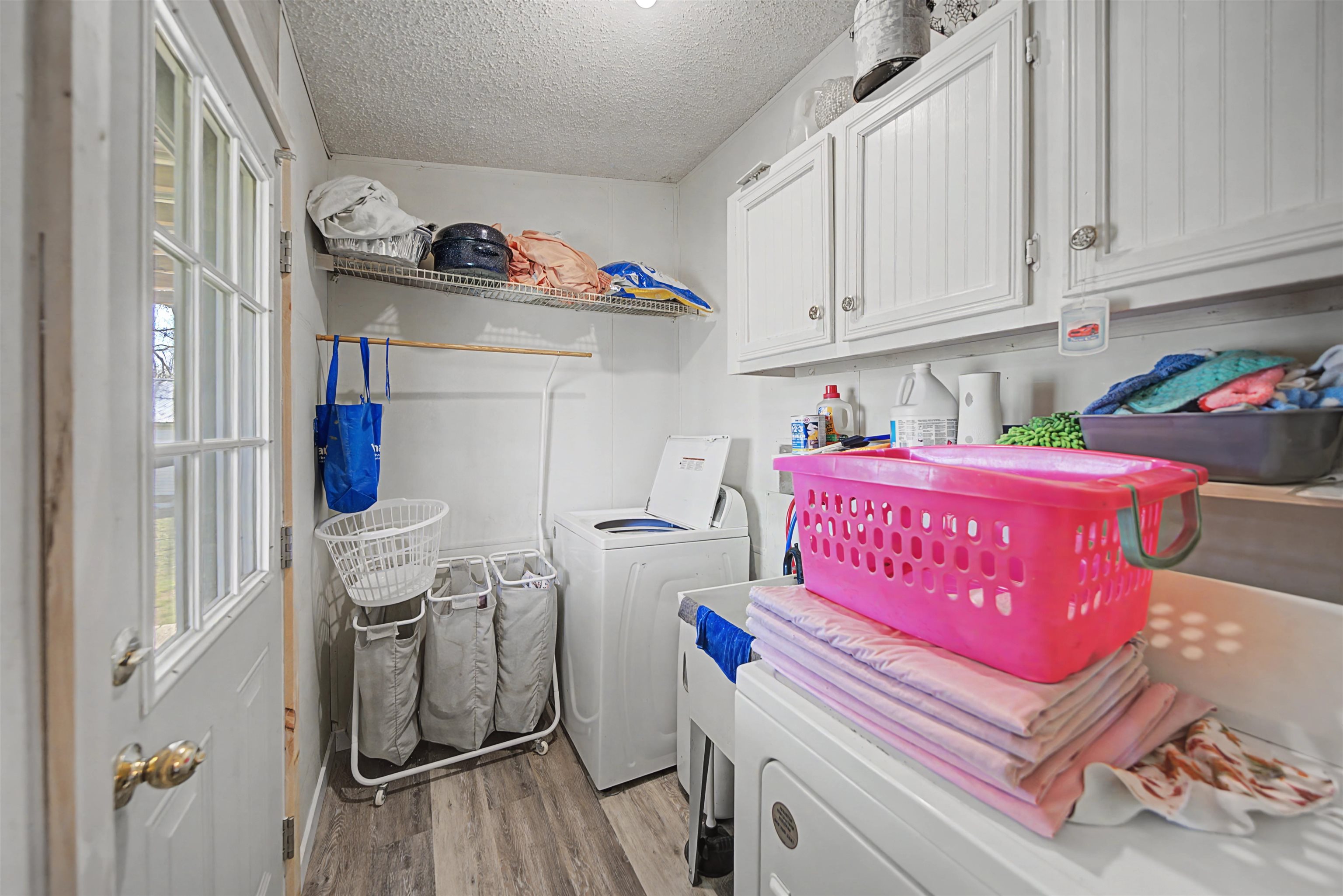 7010 22nd Highway Adamsville, TN 38310 - Photo 10 of 33 a utility room with dryer and washer