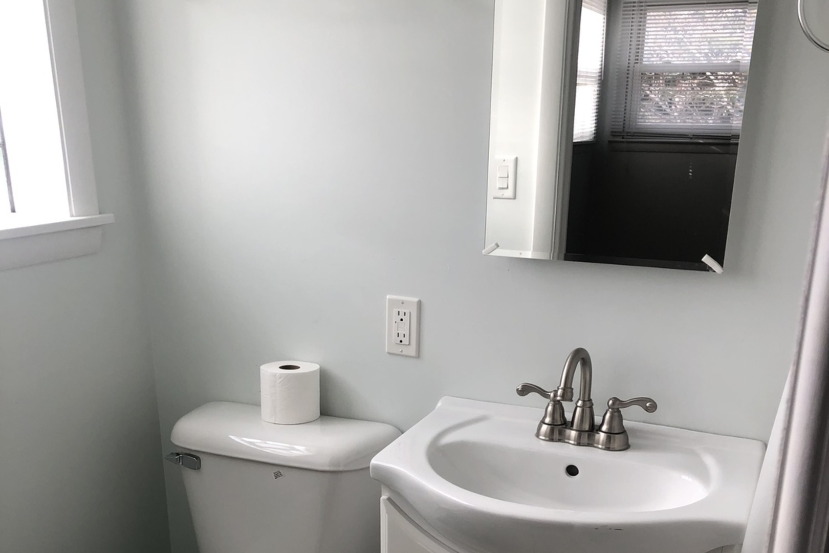 10733 South Harding Avenue Chicago, IL 60655 - Photo 16 of 20 a bathroom with a sink and a toilet