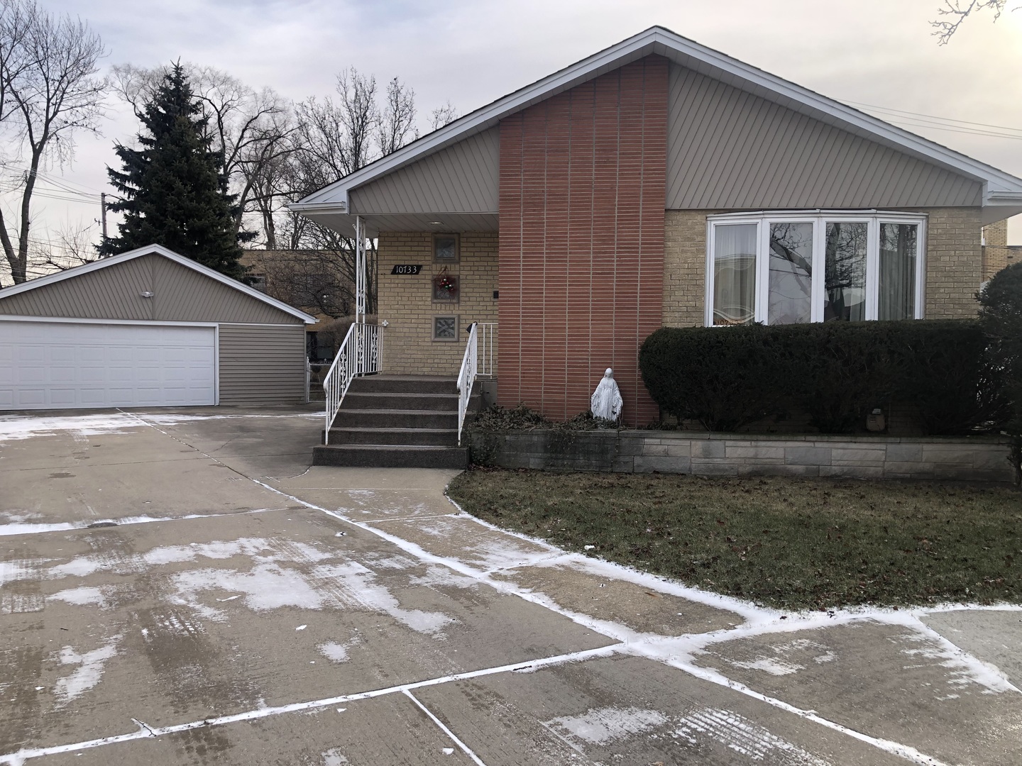 10733 South Harding Avenue Chicago, IL 60655 - Photo 2 of 20 a front view of a house with a yard