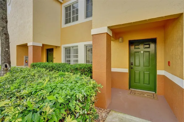 a view of a swimming pool with a garden