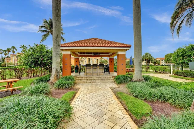 a living room with furniture fireplace and flat screen tv