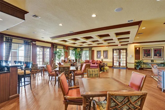 a view of a livingroom with wooden floor