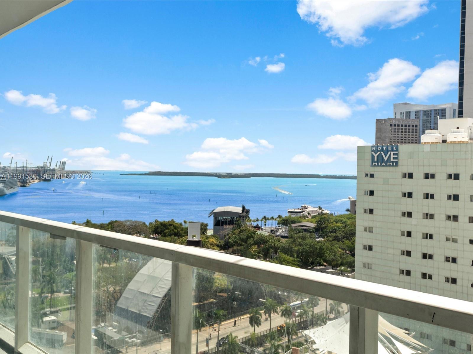 244 Biscayne Boulevard, Unit 1605 Miami, FL 33132 - Photo 1 of 46 a view of swimming pool from a balcony
