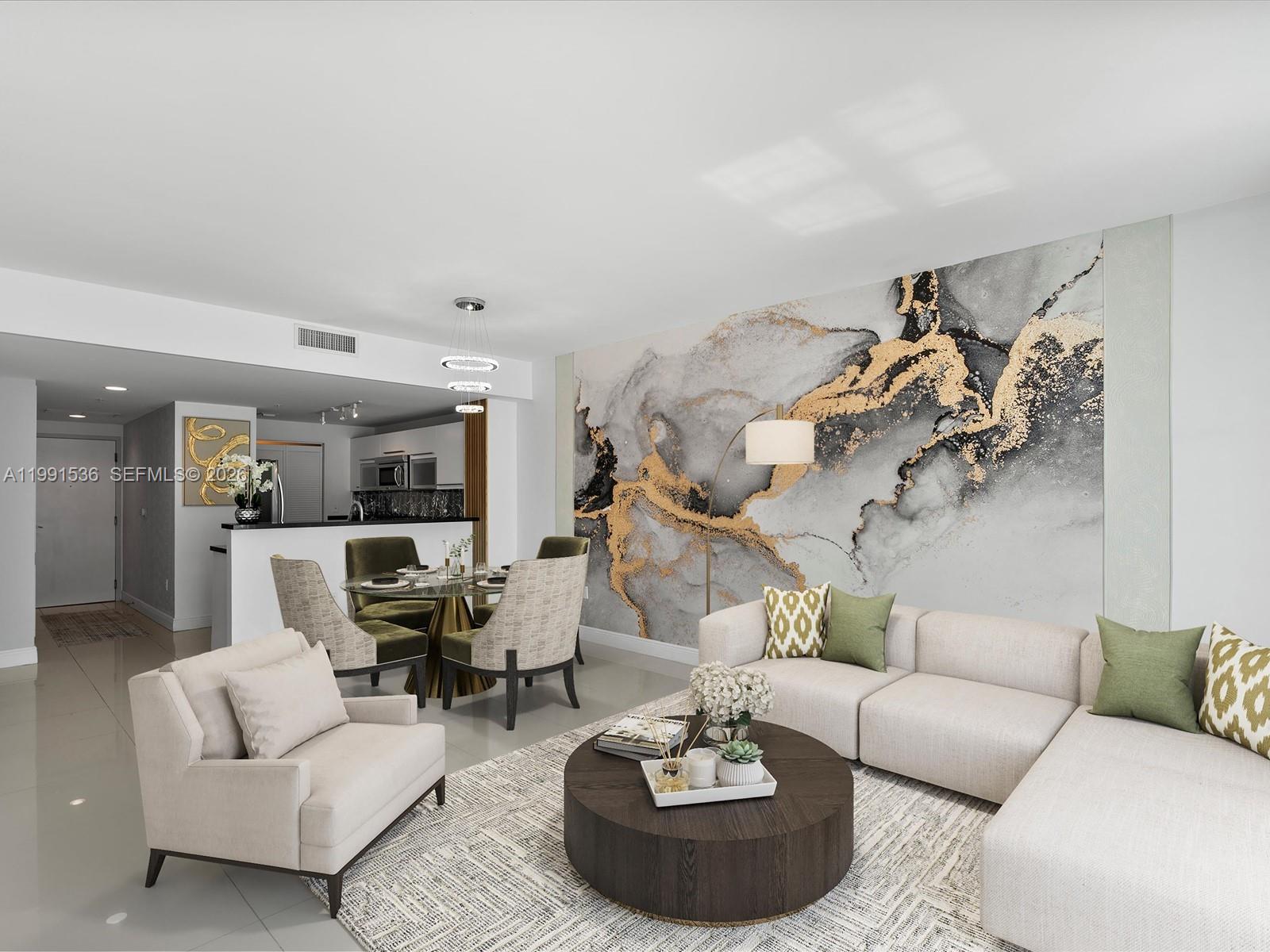 244 Biscayne Boulevard, Unit 1605 Miami, FL 33132 - Photo 11 of 46 a living room with furniture and a table