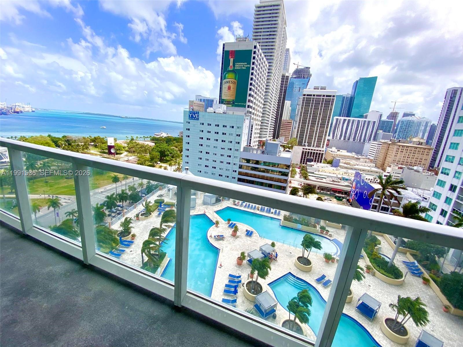 244 Biscayne Boulevard, Unit 1605 Miami, FL 33132 - Photo 31 of 46 a city view from a balcony