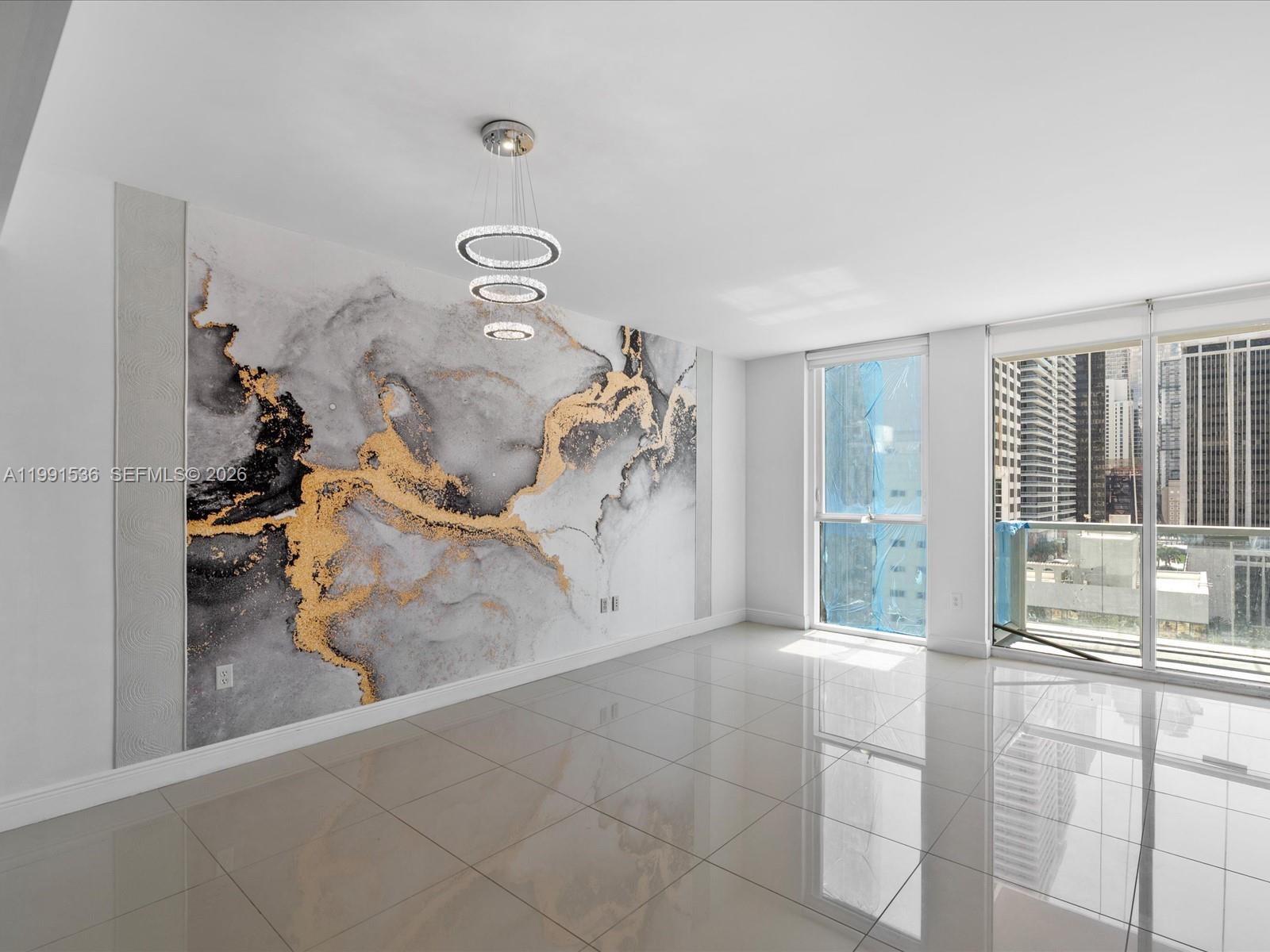 244 Biscayne Boulevard, Unit 1605 Miami, FL 33132 - Photo 9 of 46 a view of a living room
