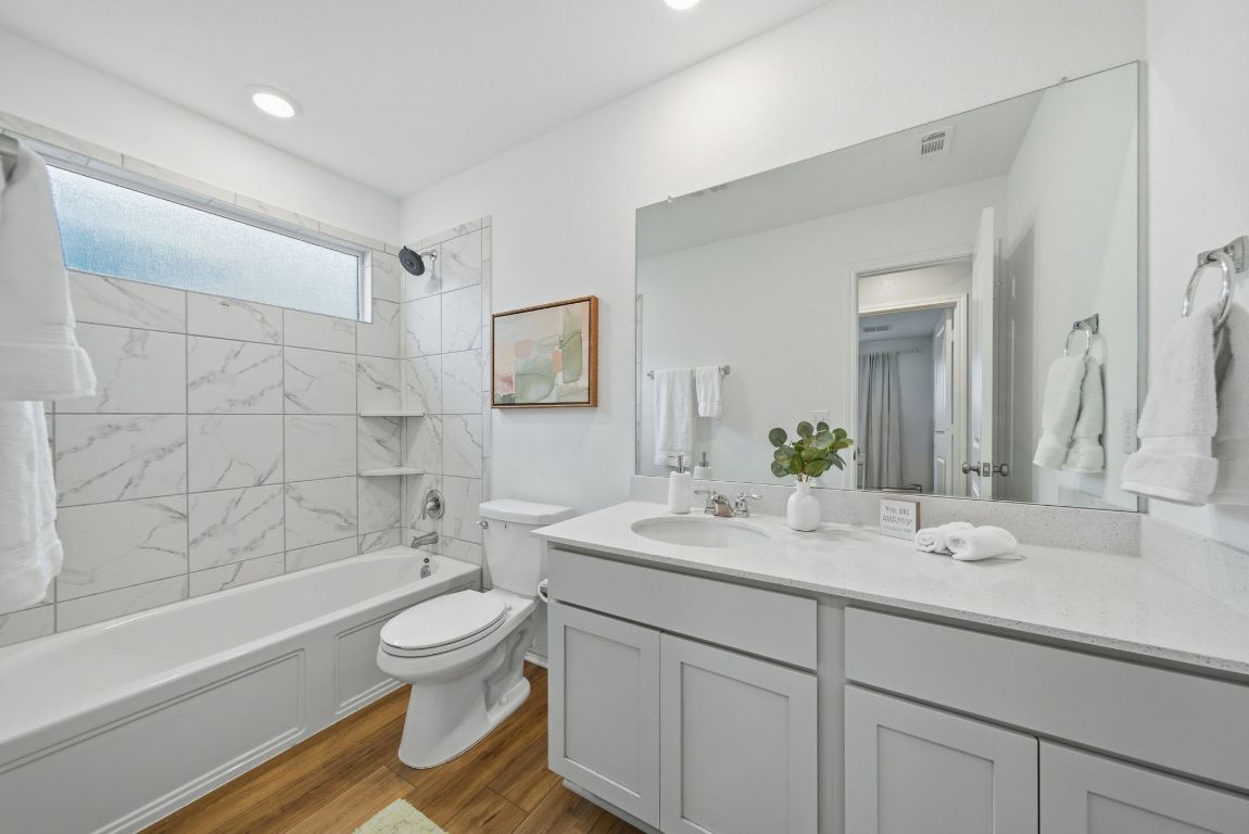 371 Jack Ryan Kyle, TX 78640 - Photo 8 of 40 Bathroom next to the office/bedroom in the front of the home