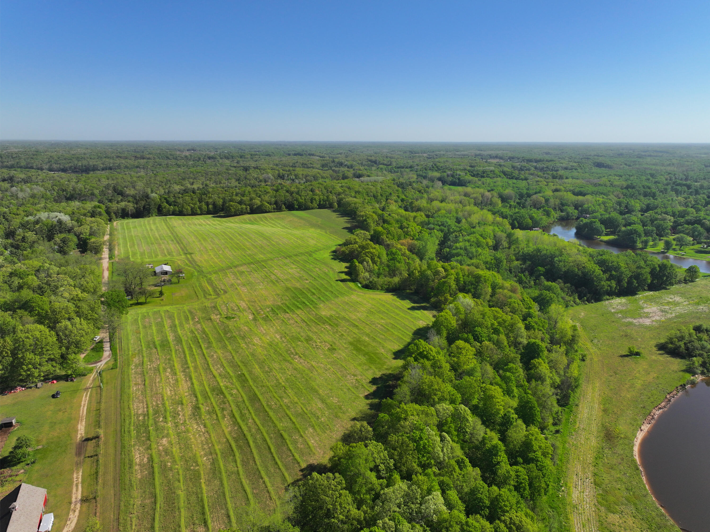 3396 Dagen Road Twin Lake, MI 49457 - Photo 3 of 56 DJI_20250516100641_0381_D