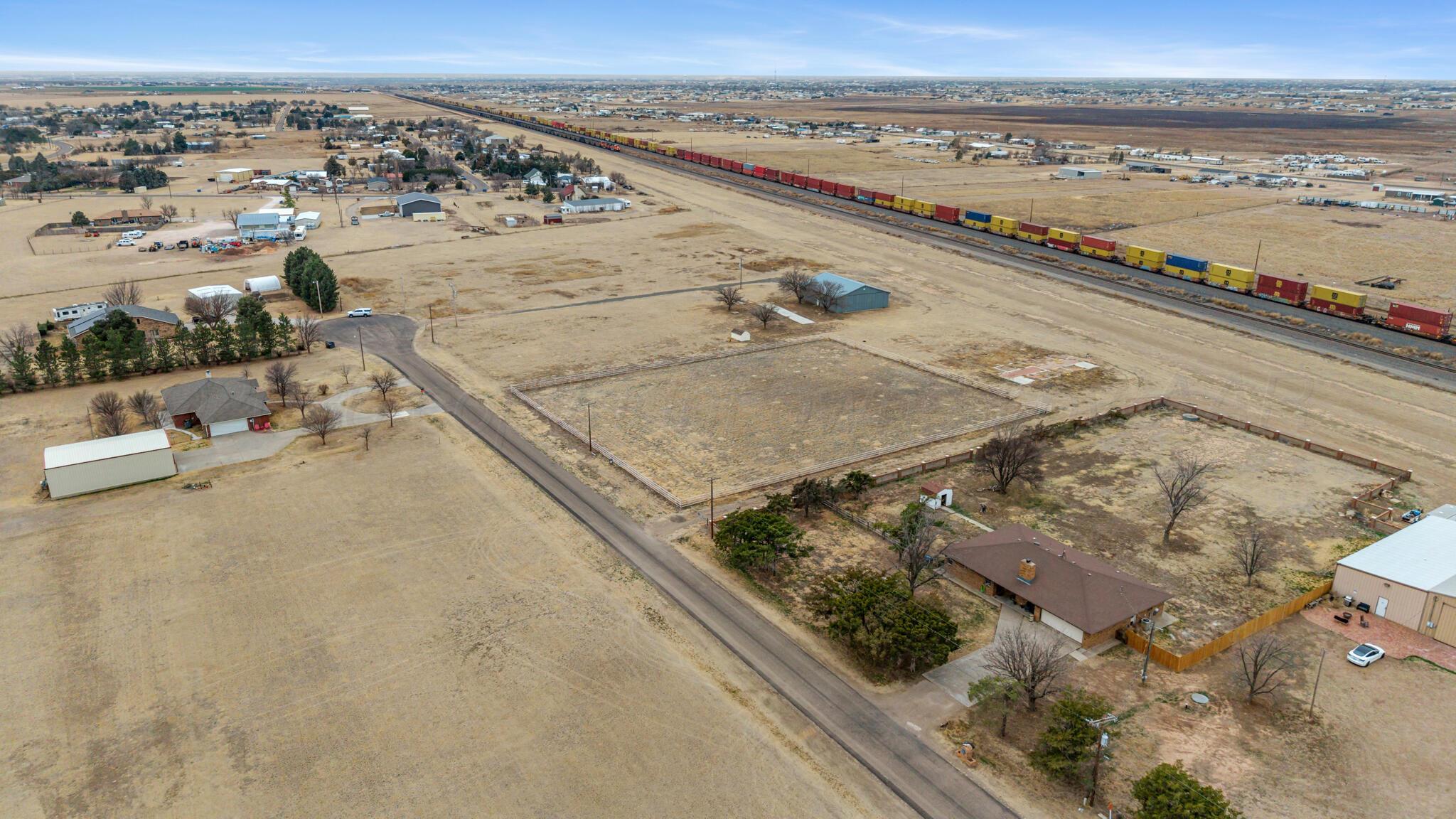 14010 Buffalo Airport Road Amarillo, TX 79118 - Photo 5 of 11 an aerial view of residential houses with outdoor space