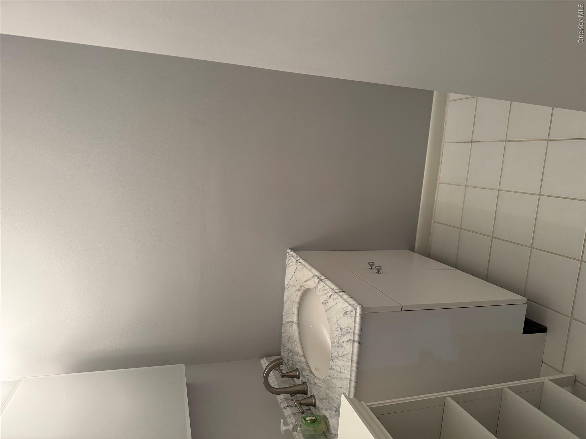 88 Eagle Ridge Way Nanuet, NY 10954 - Photo 4 of 16 a room with a sink and cabinets