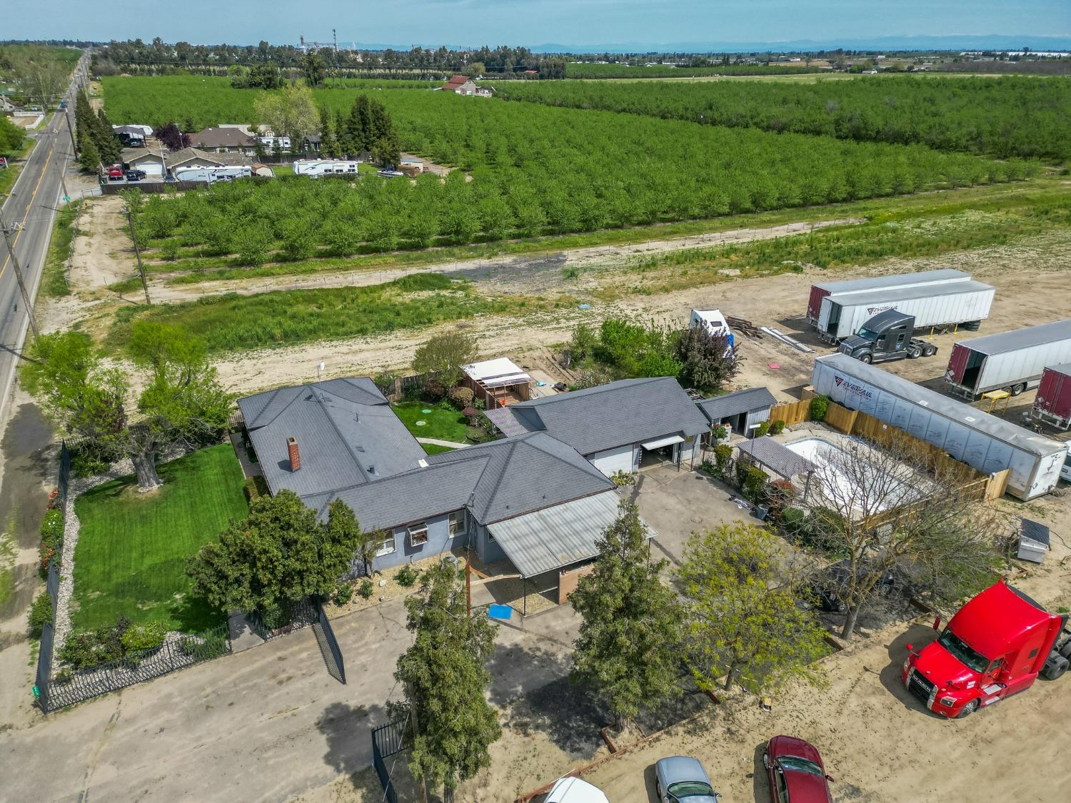 6912 Faith Home Road Ceres, CA 95307 - Photo 1 of 1 an aerial view of a house with a yard basket ball court and outdoor seating