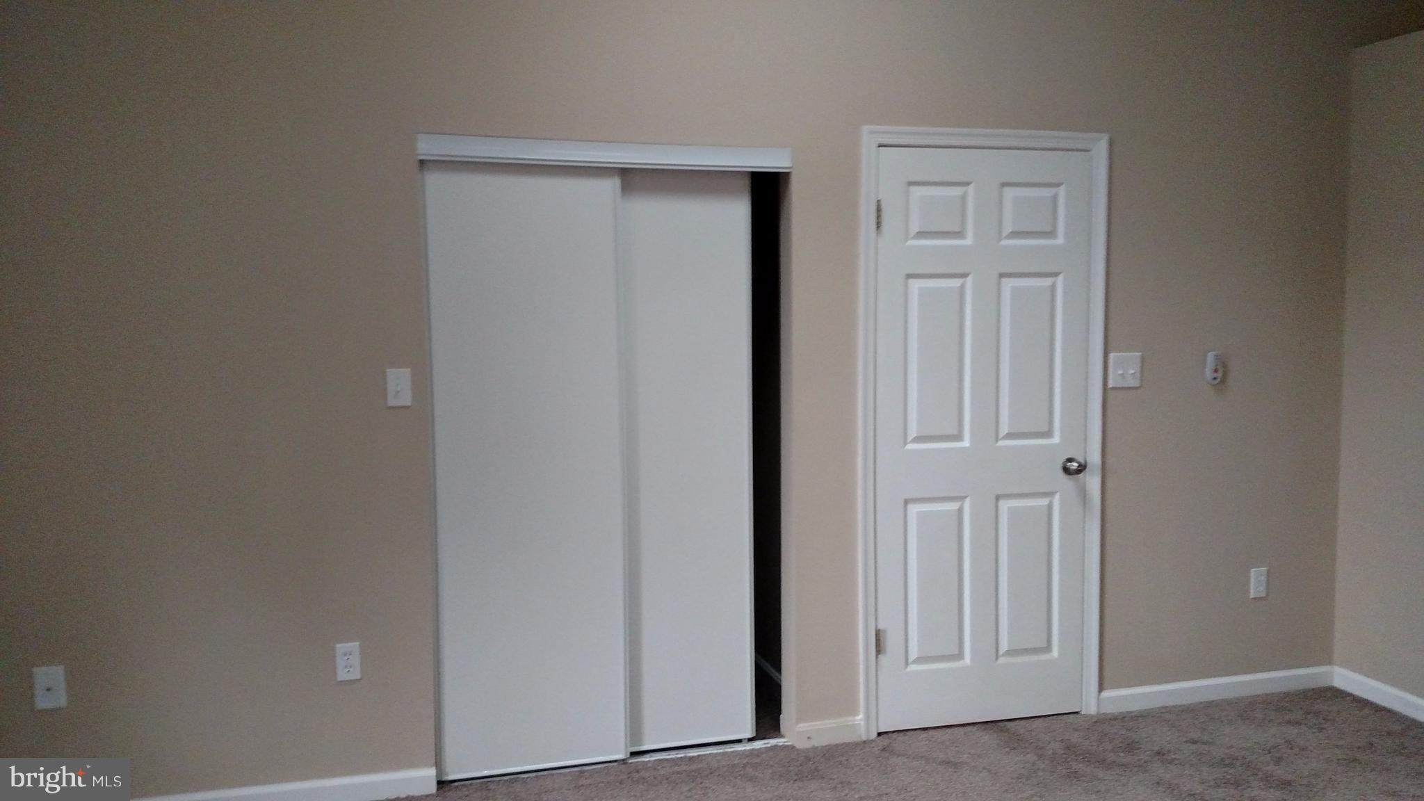 93 Griffith Way Owings, MD 20736 - Photo 11 of 22 a view of a hallway with closet area